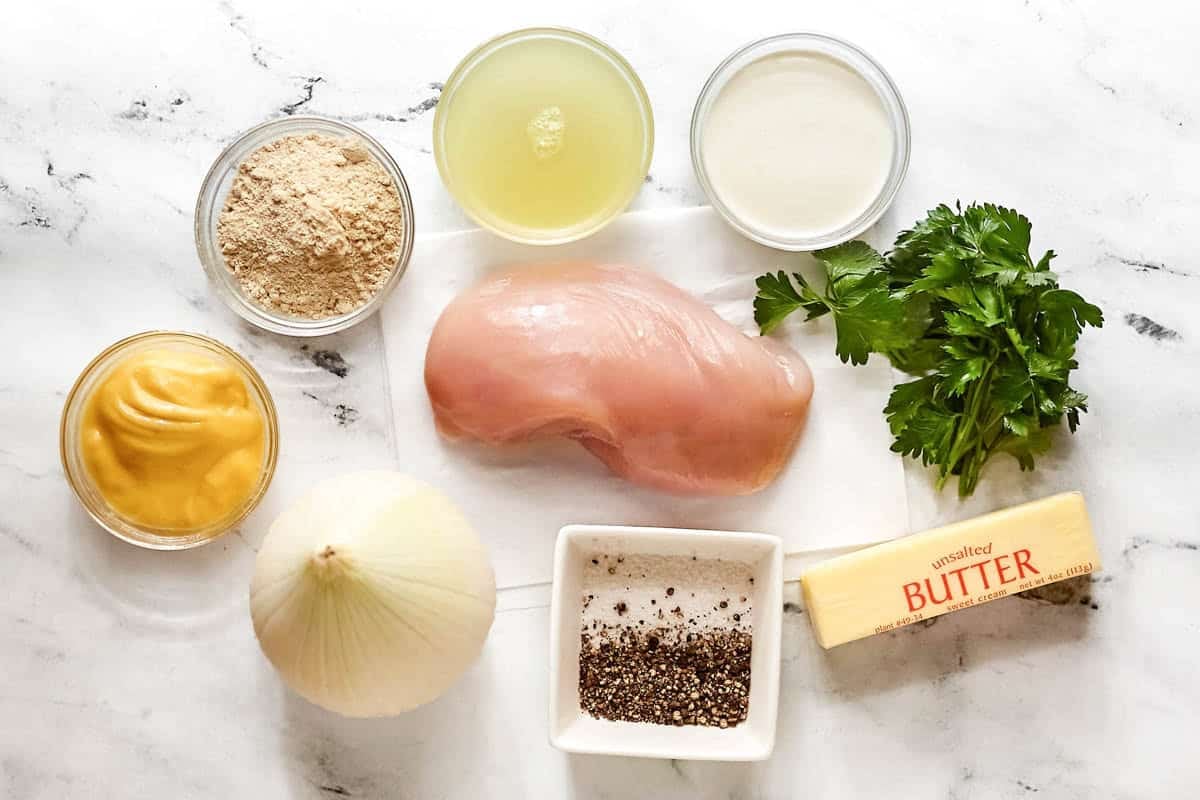Chicken, butter, onion, gravy mix, chicken soup, and seasonings.