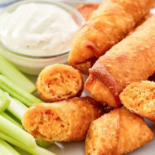 Crispy and cheesy Buffalo chicken spring roll appetizer.