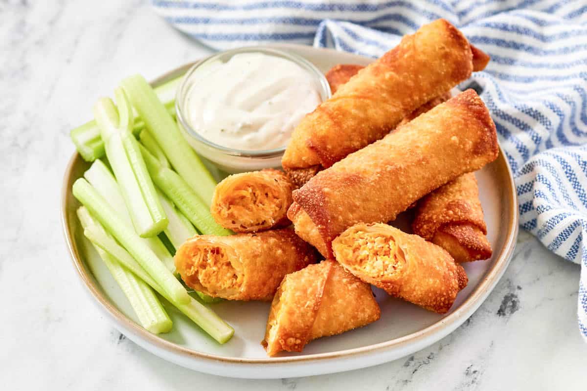 Crispy fried spring rolls filled with Buffalo chicken and cheese served with celery and blue cheese dressing.