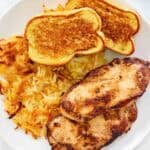 Grilled chicken, hashbrowns, and toast dinner.