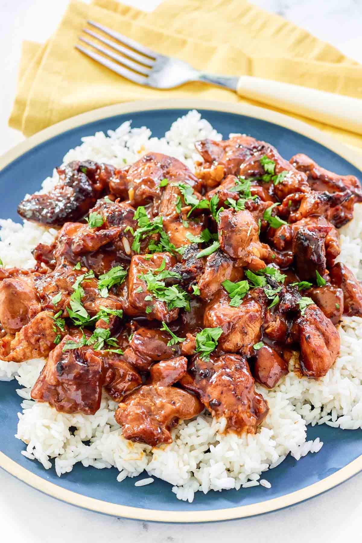 Sweet bourbon sauce chicken served over rice.