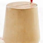 Copycat Arby's jamocha shake in a glass with a straw.