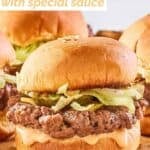A homemade Big Mac slider with special sauce, cheese, lettuce, pickles, and onions.