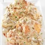 A platter of biscuits topped with homemade Bob Evans sausage gravy.
