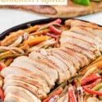 Copycat Chili's chicken fajitas on a large cast iron platter.