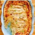 Copycat Dickey's baked potato casserole in a ceramic baking dish.