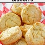 Copycat KFC buttermilk biscuits piled on parchment paper.