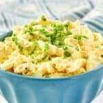 Copycat Kenny & Ziggy's egg salad topped with chopped chives.