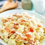 Copycat Luby's skillet cabbage with bacon on a platter.