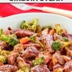 A bowl of copycat Panda Express black pepper sirloin steak and vegetables.