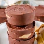 A stack of homemade Reese's peanut butter cups on a plate.