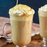 Drizzling caramel on a copycat Starbucks caramel macchiato.