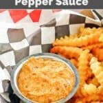 Copycat Whataburger creamy peppers sauce and crinkle-cut fries in a parchment lined basket.