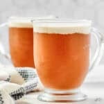 Butterscotch soda drink topped with coconut foam.