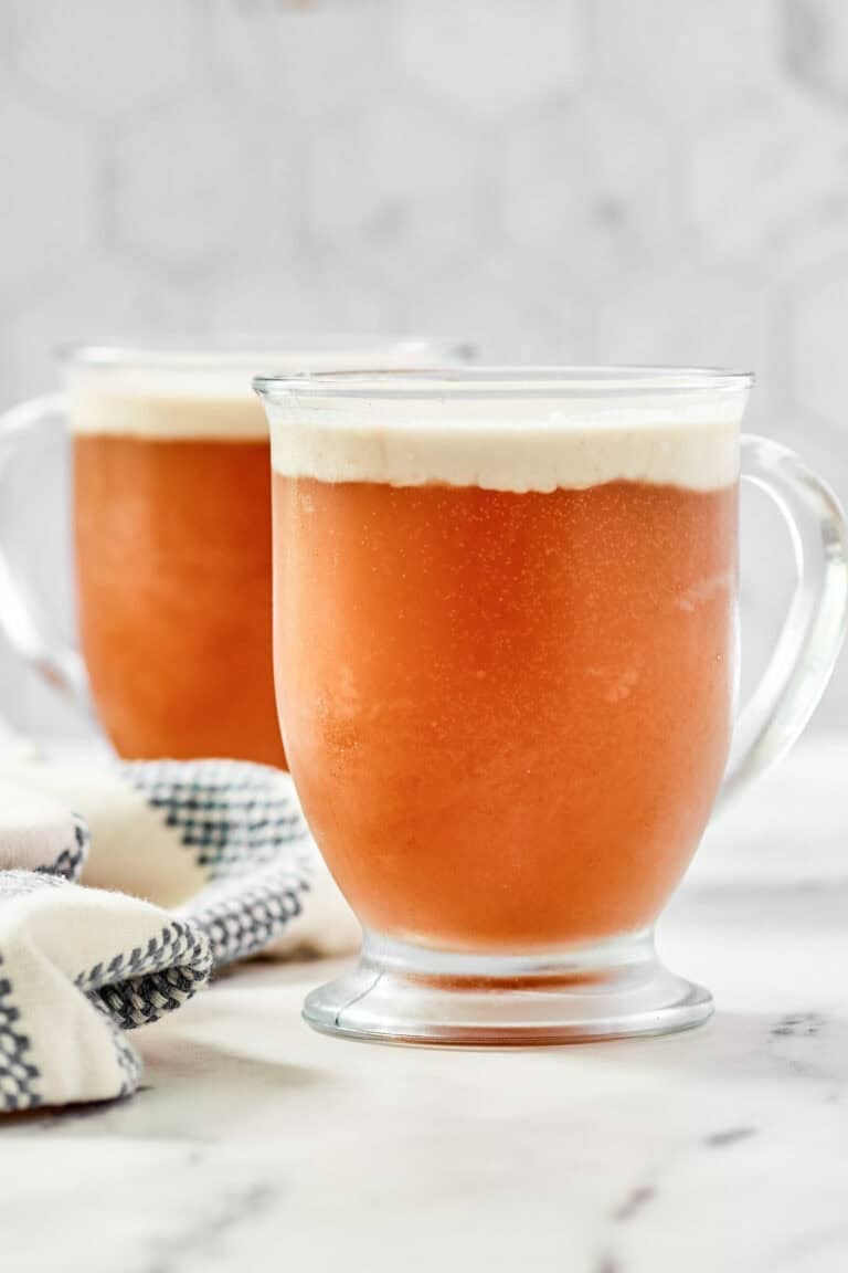 Butterscotch soda drink topped with coconut foam.