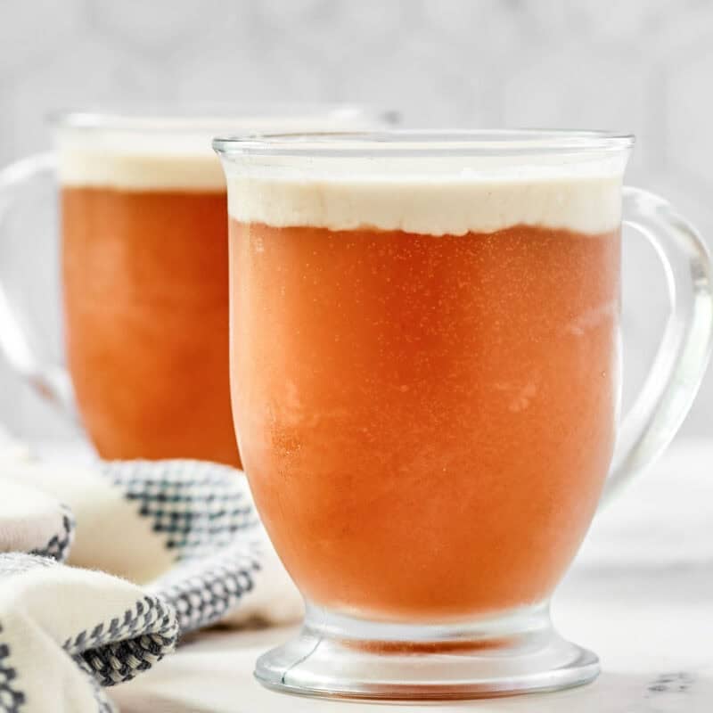 Butterscotch soda drink topped with coconut foam.