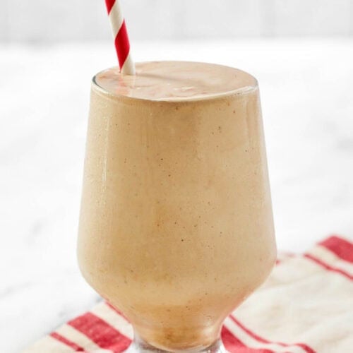 A coffee chocolate milkshake on a kitchen towel.