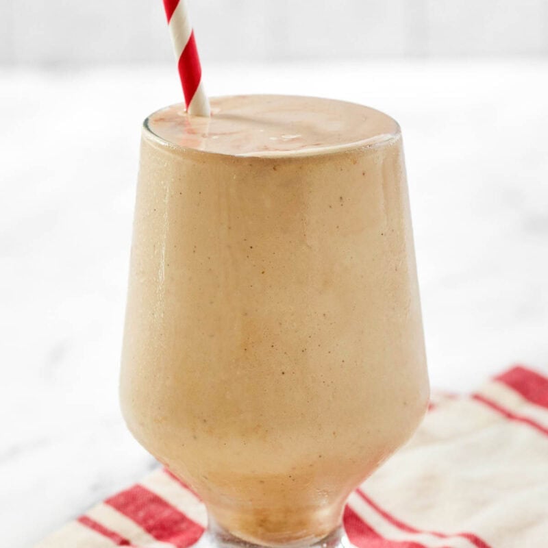 A coffee chocolate milkshake on a kitchen towel.