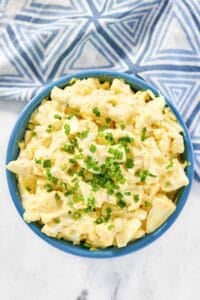 Egg salad topped with chopped chives.
