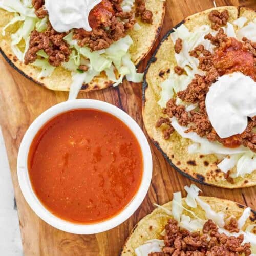 Homemade fiery hot sauce served with ground beef tostadas.