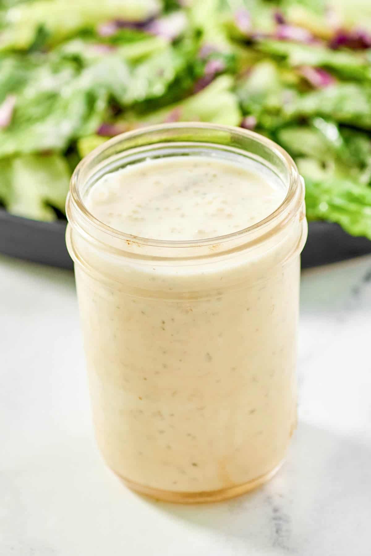 Italian salad dressing that's creamy in a mason jar.