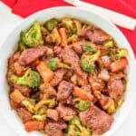 Stir fry with steak, vegetables, and black pepper sauce.