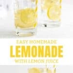 Homemade lemonade and lemon slices in glasses.