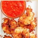 Copycat Joe's Crab Shack coconut shrimp and a small bowl of dipping sauce.
