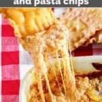 Fried lasagna noodle dipping into copycat Olive Garden lasagna dip.