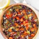 Copycat Panera black bean soup in a wooden bowl.