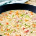 Copycat US senate navy bean soup garnished with green onions.