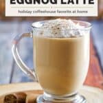 Copycat Starbucks eggnog latte topped with whipped cream in a glass mug.