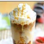Copycat Starbucks iced coconut mocha macchiato with whipped cream and caramel drizzle on top.