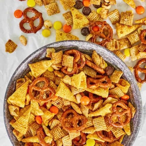 Crunchy, butter, sweet, and salty snack mix in a bowl.