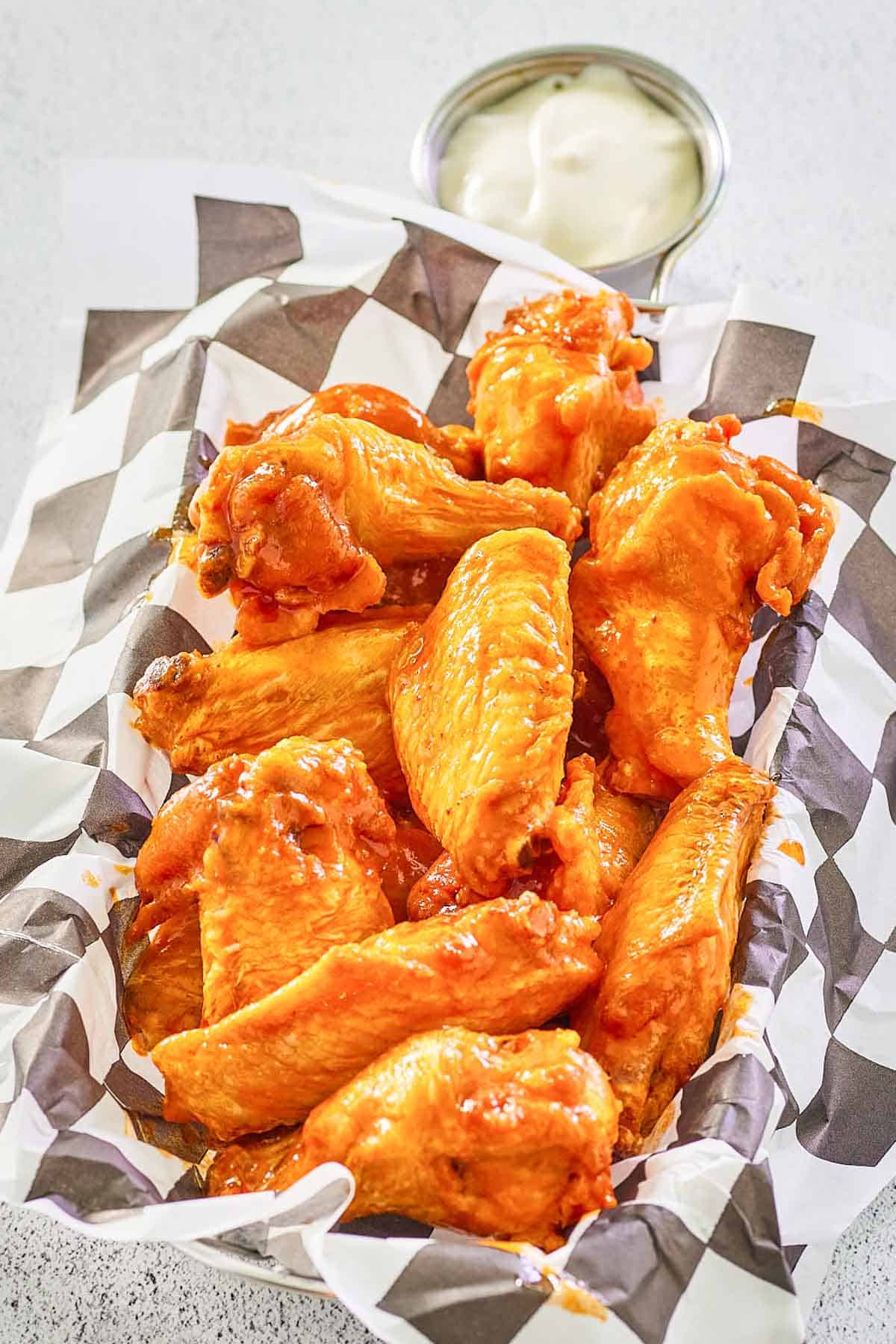 Chicken wings tossed with buttery Louisiana hot sauce.