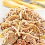 Creamy American chop suey with ground beef and rice topped with crunchy chow mein noodles.