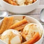 Copycat Brennan's bananas foster in bowls on a placemat.