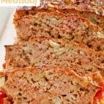 Sliced brown sugar meatloaf on a platter.