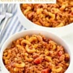 Bowls of chili mac and cheese made in a pot on the stovetop.