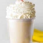 Copycat Fatburger banana milkshake with whipped cream on top.
