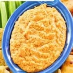Copycat Hooters Buffalo chicken dip served with tortilla chips and celery.
