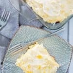 Southern pig pickin' cake in a glass baking dish and a slice on a plate.