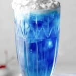 Copycat Ruby Tuesday Smurf Punch in a tall glass.