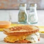 Copycat Steak 'n Shake Frisco melt sandwich, Frisco sauce, and salt and pepper shakers.