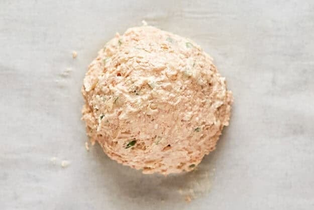 Ham and cream cheese mixture formed into a ball.
