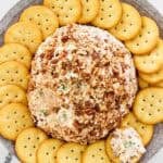 Ham and cream cheese ball coated in pecans and served with crackers.