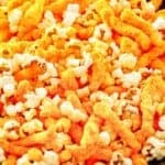 Homemade Cheetos popcorn in a large serving bowl.