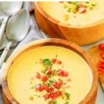 Copycat Houston's Canadian cheese soup in two wooden bowls.