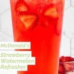 Copycat Starbucks strawberry watermelon refresher and a bowl of fresh strawberries.
