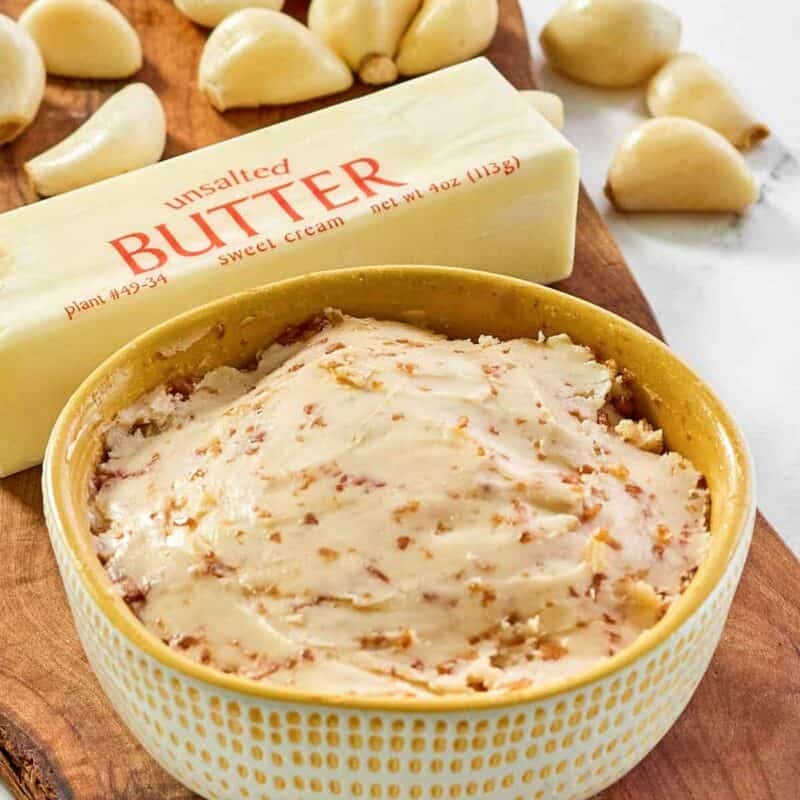 Hibachi-style garlic soy butter, a stick of butter, and garlic cloves.